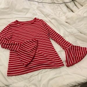 Striped long sleeve shirt with flair sleeves.